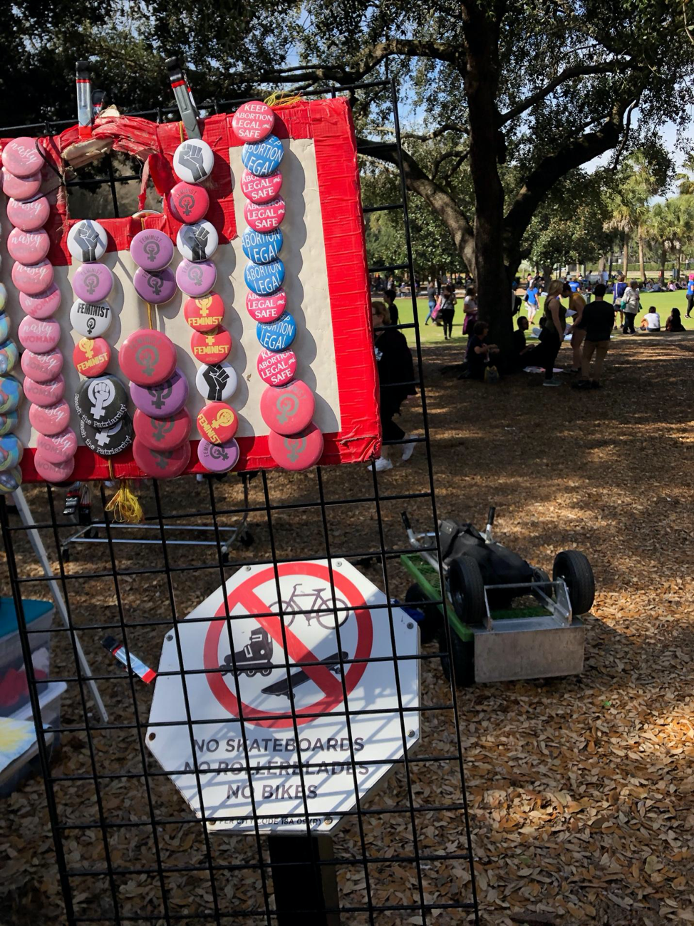 Figure 5. Image showing buttons for legalizing abortion sold at Lake Eola Park on Jan. 19, 2019.