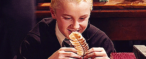 Draco Malfoy and his feather