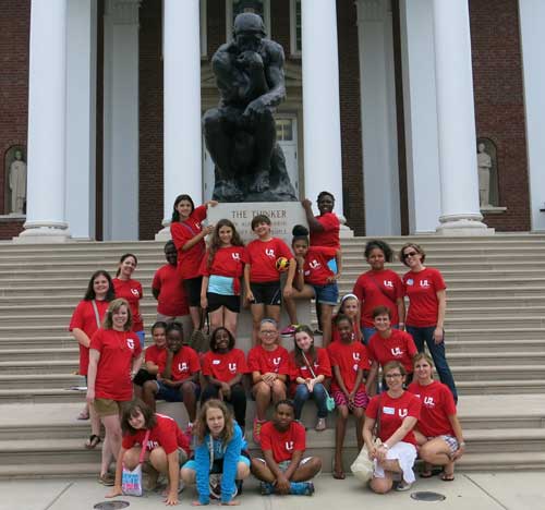 All campers and teachers in front of Rodin's The Thinker