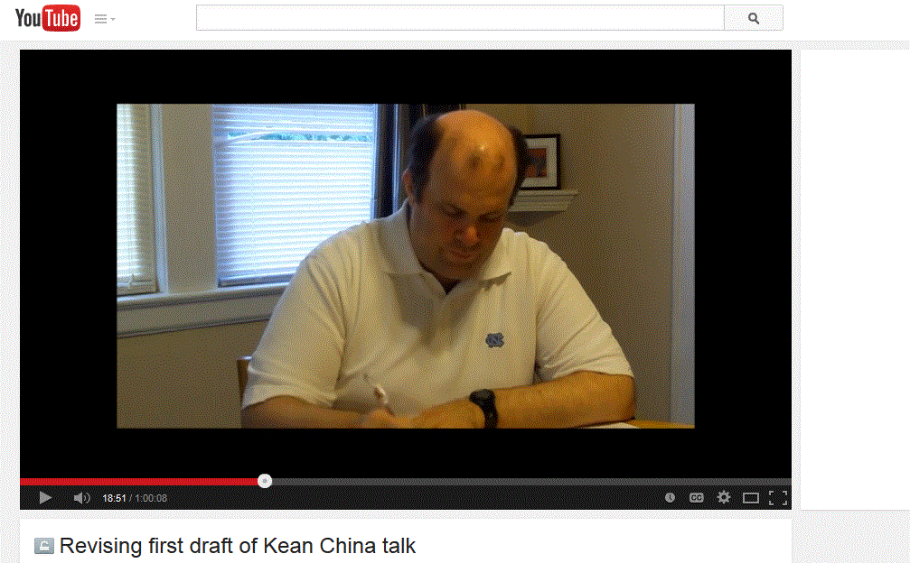 screenshot of youtube video showing article's author writing