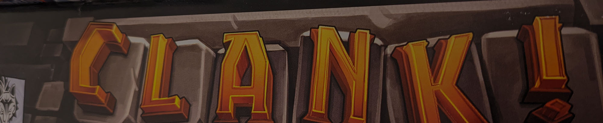 banner showing an up close view of the side of a board game box on a shelf