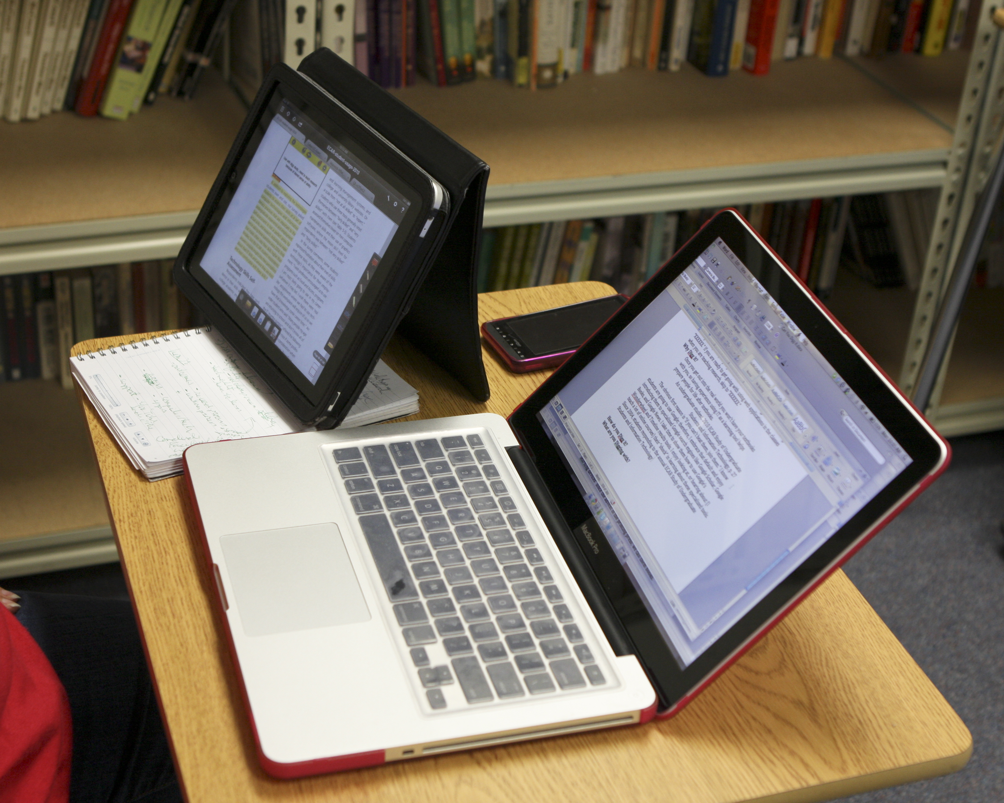Teacher using MacBook Pro & iPad simultaneously