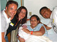 surrogate family pictured with non-surrogate family.