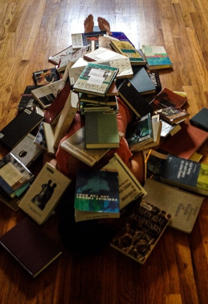 Photo of my body covered with books